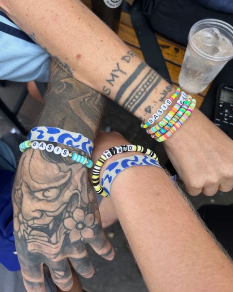 Beers, Bucket Hats, and Brotherhood at the  Oasis Reunion Show in Wales